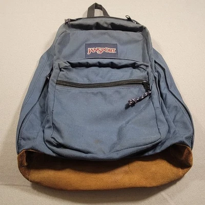 Mochila Jansport vintage años 90 azul lona cuero gamuza parte inferior bolsa de libros clásica Foto 1 de 4