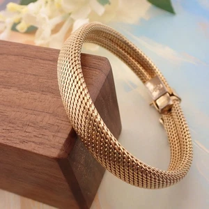 Bracciale vintage 1959 Grosse Christian Dior maglia tono oro 7 1/2" avvolgente - Foto 1 di 7