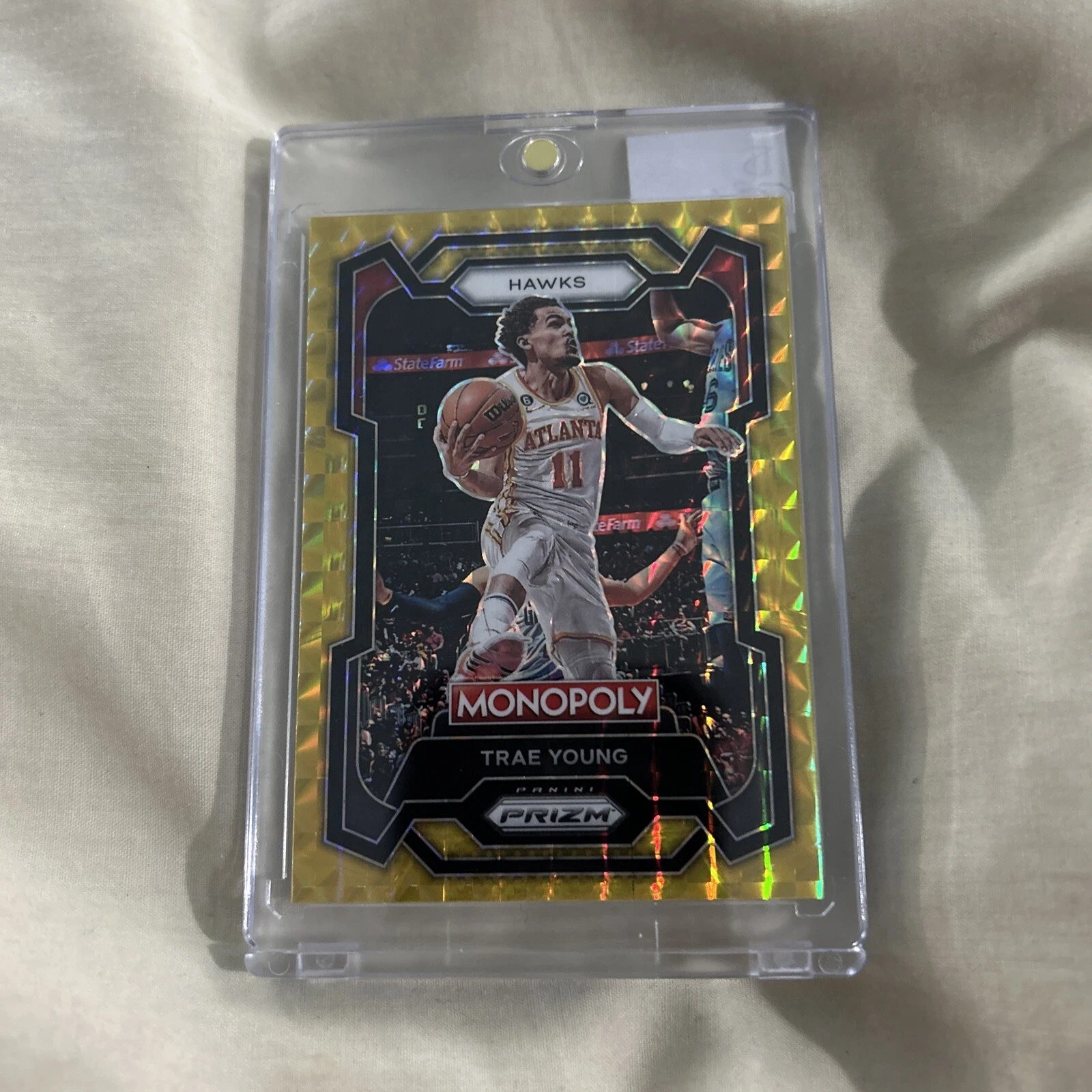 Trae Young 2023-24 Panini Prizm Monopoly Gold Prizm /49 #4 NBA Atlanta Hawks