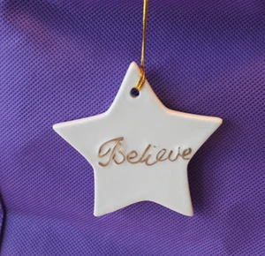 Adorno estrella de Navidad Believe - Imagen 1 de 2