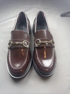 Mocasín plano American Eagle talla 7 NUEVO para mujer herrajes marrón - Imagen 1 de 4