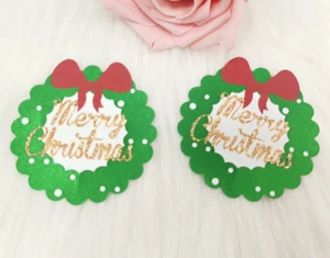 Cache-tétons nippies pasties adhésifs fins couronnes Noël vertes merry christmas - Imagen 1 de 4