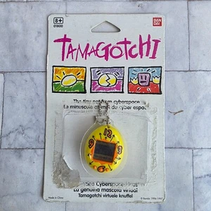 Tamagotchi gelbe Uhr Variante Vintage 1997 mit Karte Top Zustand - Bild 1 von 3