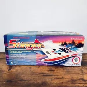 VTG RADIO SHACK STINGER RADIO CONTROLLED RC RACING BOAT W/ OG PACKAGING & MANUAL - Picture 1 of 8