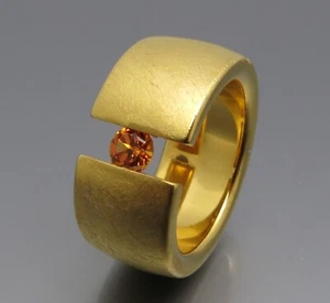DISEÑO NEUMÁTICO - ELEGANTE ANILLO TENSOR SAFIR NARANJA - DE ORFEBRERÍA PROPIA - Imagen 1 de 5