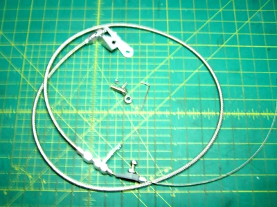 Cable de retención de transmisión trenzado de acero inoxidable 6048 para transmisiones Ford C6 Foto 1 de 4