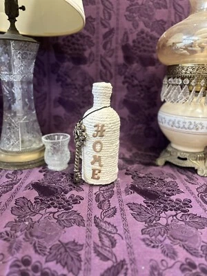 Decorative Glass Vodka Bottle Wrapped in a Cream Rope Home in wood letters & key - Image 1 of 3