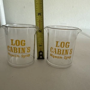 2 VTG Log Cabin’s Wigwam Syrup’ Double Spout Mini PLASTIC Cup Dispenser Beaker - Picture 1 of 3