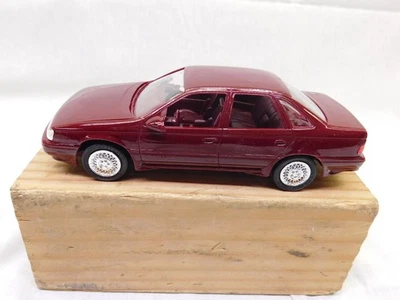 NEW AMT 1/25 SCALE 1989 FORD TAURUS GT   IN RED  PROMO MODEL ERTL - Image 1 of 4