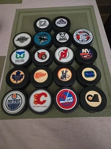Vintage NHL Hockey Puck Lot Of 18 Era Varies 70s, 80s, And 90s Great Condition - Picture 1 of 12