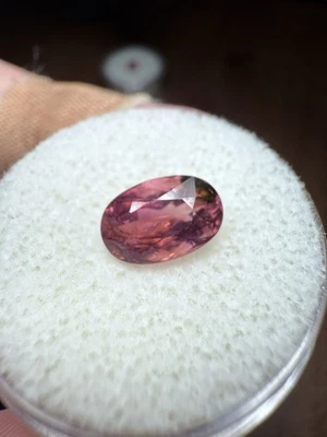 2.05 CT Beautiful Peachy Pink Tourmaline with Dark Phantom. 9x6mm. Oval Cut - Image 1 of 4