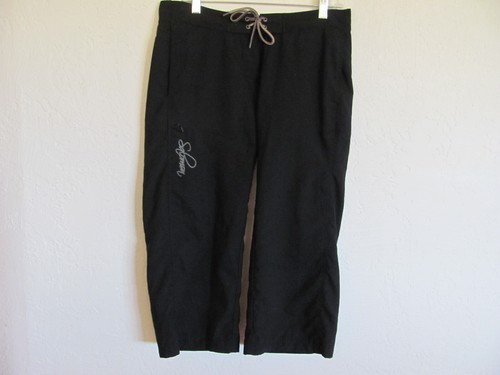 Pantaloni Salomon Cargo Capri 1 tasca cargo nero design floreale taglia 8 10 L 21 75