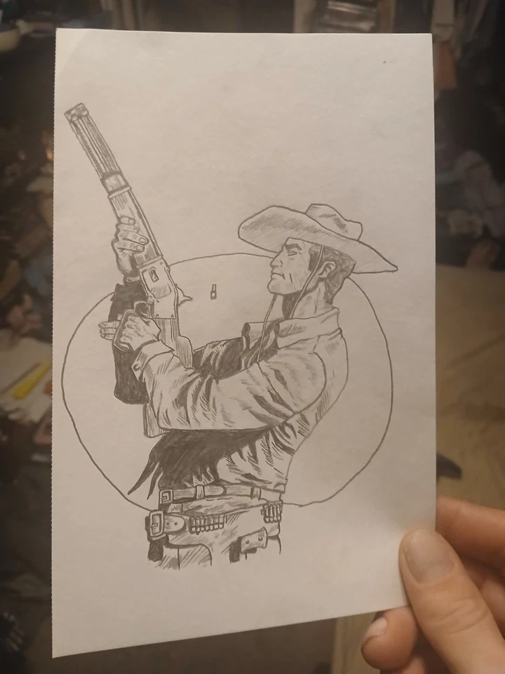 Vaquero con dibujo de rifle Foto 1 de 1