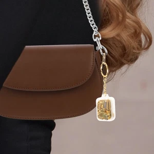Music Box Keychain Travel Miss Musical Instrument Keychains for Women - Foto 1 di 12