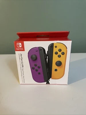Nintendo Switch Joy-Con Pair, Neon Purple and Neon Orange - Free Shipping - Image 1 of 4