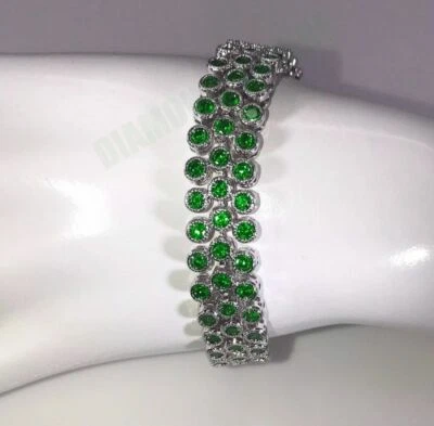 Brazalete de tenis de tres filas de circonita cúbica enchapado en plata esmeralda verde creado en laboratorio en acero Foto 1 de 4