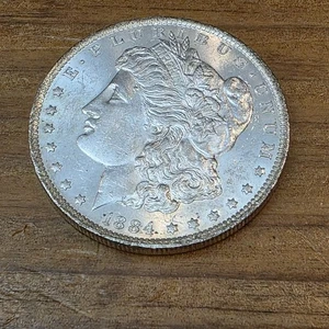 US 1884 - O New Orleans Morgan SILVER DOLLAR in Plastic Holder (AU) - Picture 1 of 7