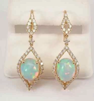 Pendientes colgantes/gotas de ópalo de fuego de corte ovalado de 2 quilates enchapados en oro amarillo de 14 quilates Foto 1 de 4