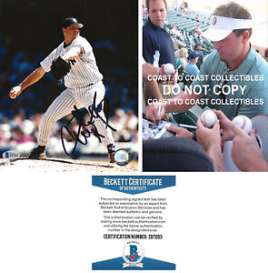 Roger Clemens signed New York Yankees baseball 8x10 photo Beckett COA autograph