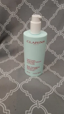 ClarinsLeche hidratante suavizante corporal con aloe vera, para piel normal 400 ml/13,9 oz Foto 1 de 2