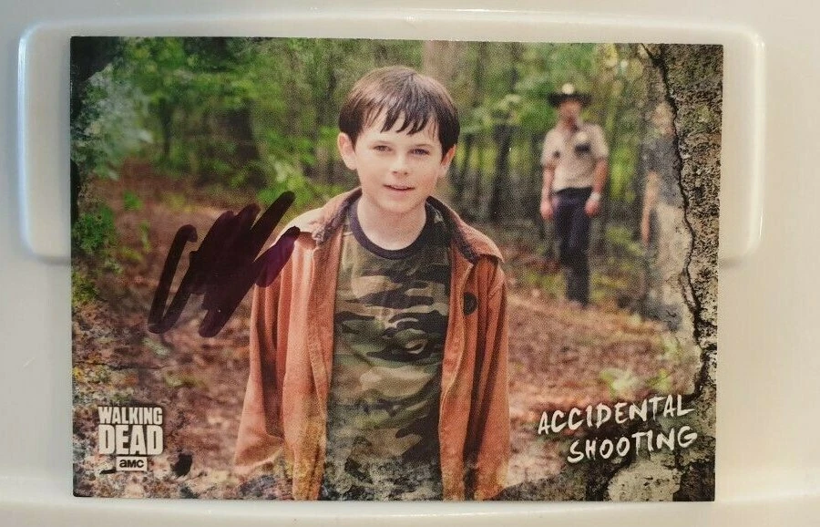 The Walking Dead CHANDLER RIGGS Signed Topps Trading Card (Carl) - Image 1 of 1