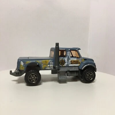 Camión Matchbox 2017 "Jungle Mission" International CXT AZUL MATE GRIS CASI NUEVO MUY BUEN ESTADO Foto 1 de 4