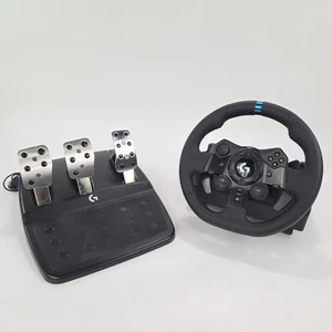 Logitech G923 Racing Wheel and Pedals, 100 Hz Force Feedback para PS5, PS4, PC - Imagen 1 de 13