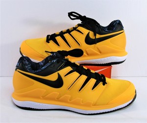 black and yellow tennis shoes