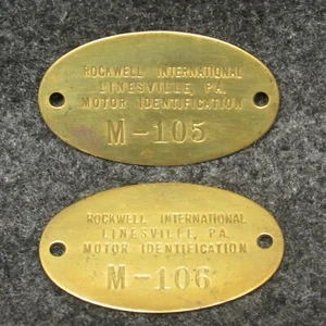 2 Rockwell International Linesville PA Motor ID Brass Tag Fobs M-105 M-106 2" - Imagen 1 de 2