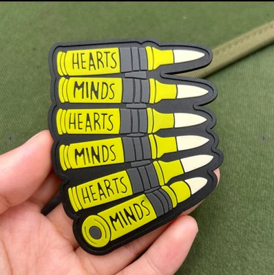 STUNNING AND RARE "HEARTS AND MINDS" PVC SEW-ON PATCH... - Image 1 of 2