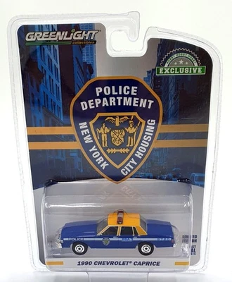 Greenlight 1/64 Scale 30159 - 1990 Chevrolet Caprice NYC Police Car Blue/Yellow - Image 1 of 4