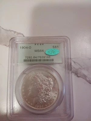 1904-O $1 Morgan Silver Dollar PCGS CAC MS64+ Plus - Image 1 of 2