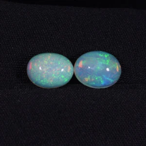 2.60 ct FINE GRADE FULL RAINBOW PLAY NATURAL RAINBOW OPAL GEMS Cabochon Pair - Picture 1 of 2