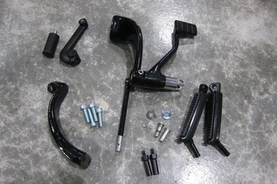 Soportes estriberas controles medios negros Sportster 2014-2021 OEM Harley Davidson Foto 1 de 4