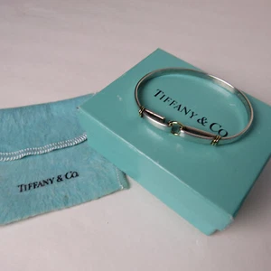 Pulsera Tiffany & Co de plata de ley con centro circular de oro de 18 quilates y detalles - Imagen 1 de 6