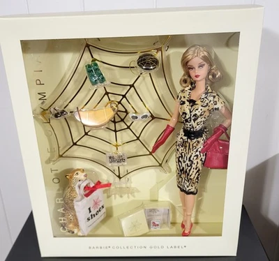 Muñeca Barbie Niña Charlotte Olympia 2016 Etiqueta Dorada NRFB Mattel en Leopardo Foto 1 de 4