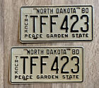 North Dakota Truck License Plate Pair 1980 #TFF423 Black On White ND ?80