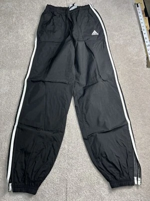 Pantalones de chándal de nailon a rayas descoloridos pequeños de colección de los 90 Adidas para hombre negros Foto 1 de 4