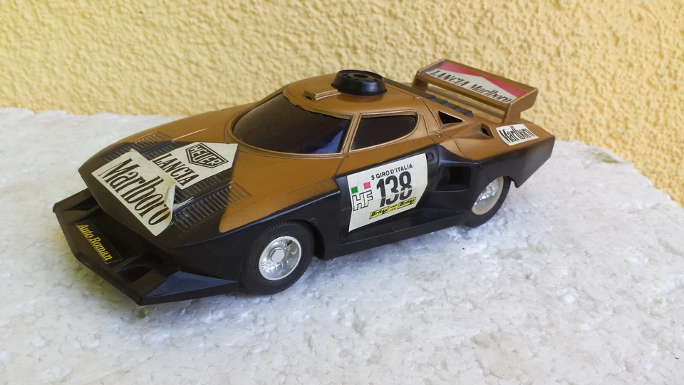 Lancia Stratos ca.1:20 Modellauto 80er Hong Kong Rennwagen Marlboro Heuer Uhren - Bild 1 von 4