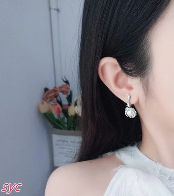 New teardrop shaped earrings imitating crystal pearls, mixed cut, white, rhodium - Image 1 of 4