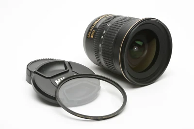Nikon AF-S Nikkor 12-24mm f4G ED DX w/Caps, UV filter, USA Version - Image 1 of 4