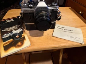 Canon AE-1 ANALOGE SPIEGELREFLEXKAMERA MIT PROMATIC AUTO WINDER/SCHULTERGURT UNGETESTET - Bild 1 von 6