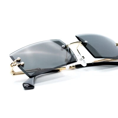 Gafas de sol rectangulares retro con marco dorado sin montura de tinte negro vintage para hombre Foto 1 de 4