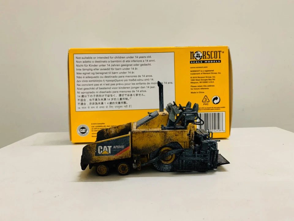 Norscot Cat AP600D Asphalt Paver Muddy Edition 1:50 Scale DieCast Model 55259 - Image 1 of 4