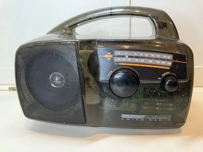 Vintage Freeplay Self Powered AM/FM Radio Solar Crank Clear See Through - Image 1 of 4