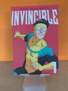 Invincible Vol. 1 (New Edition) Paperback – 2023 by Robert Kirkman - Picture 1 of 2