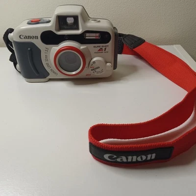 Cámara fotográfica panorámica Canon Sure Shot A1 35 mm correa impermeable para el cuello  Foto 1 de 4
