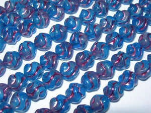 15 cuentas de vidrio checo nudo de amor redondo torcido azul capri de 9 mm con rosa - Imagen 1 de 1