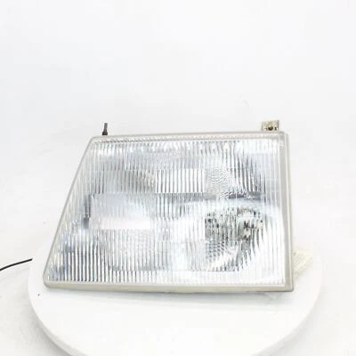 Conjunto de faro izquierdo Ford F150 1998 número de pieza - 114-00494L Foto 1 de 4