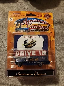 Golden Wheels American Cruisers Teal Pontiac Tempest with Vintage Drive In Sign - Picture 1 of 2